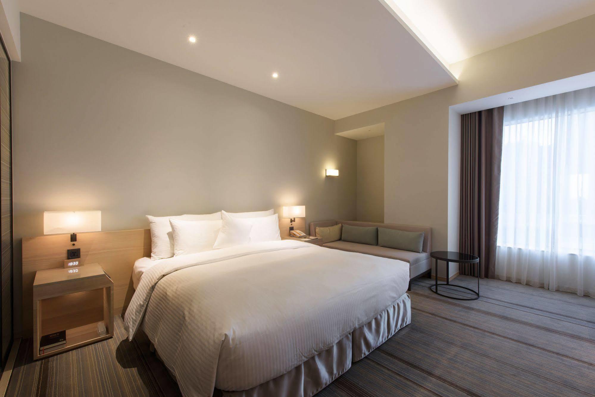 Hotel Cozzi Zhongshan Каосюн Екстериор снимка